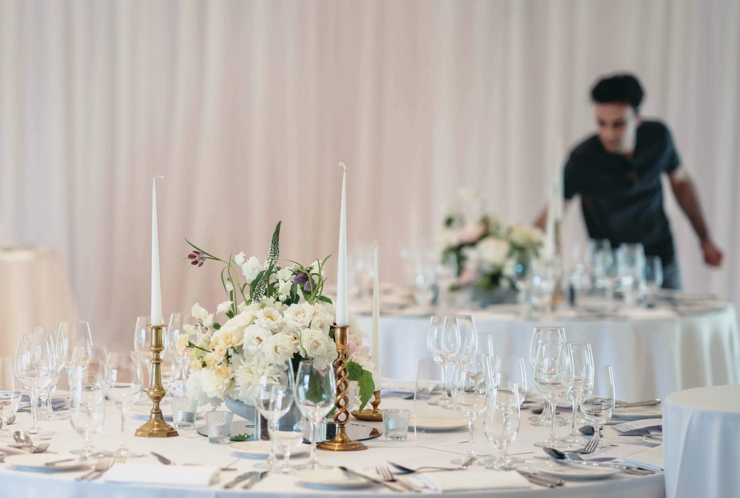 Blooming haus, white low table flower arrangements for a wedding