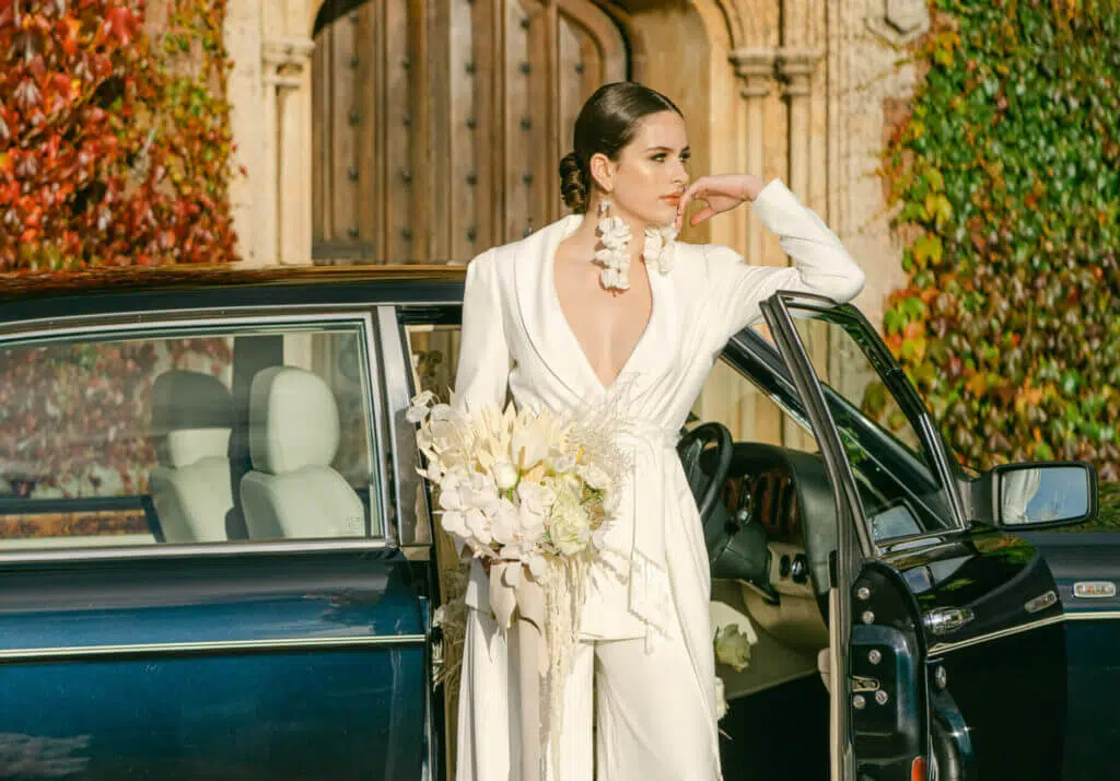 Bride holding a modern white bridal bouquet