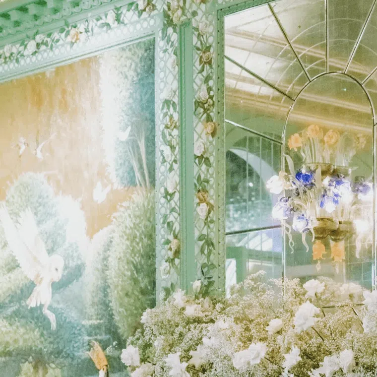 White flowers against the backdrop of a mirror