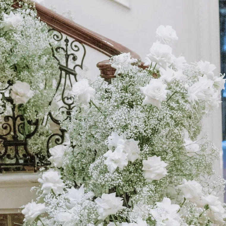 White flowers decorating a balustrade