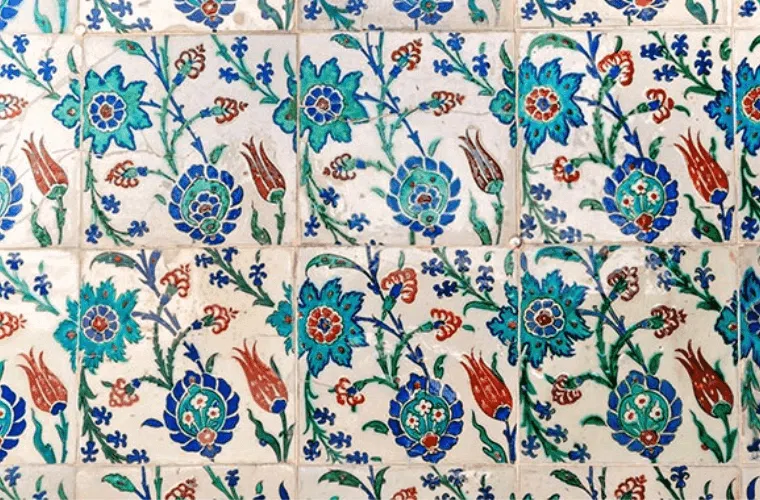 An insightful guide to flower fashion & its evolution through the ages 20 Tulip period design on tiles in blue, red, and green