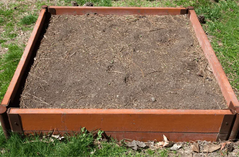 An empty raised bed for flowers