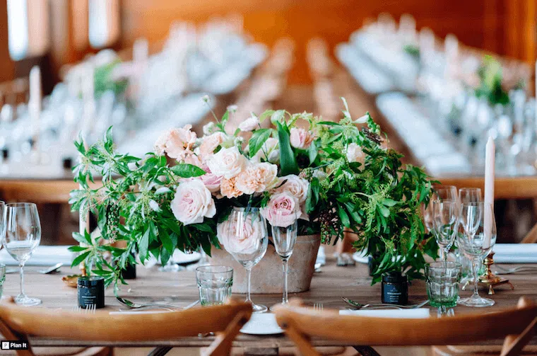 Pink and peach rose table arrangements for a micro wedding