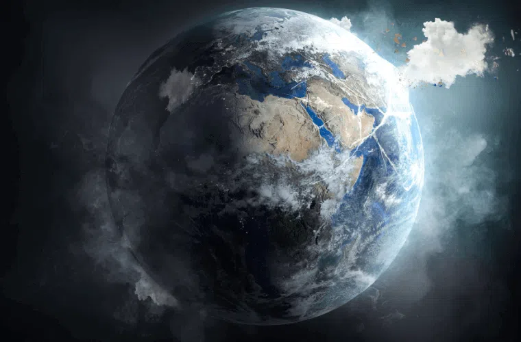 An image of a damaged earth with smoke around it