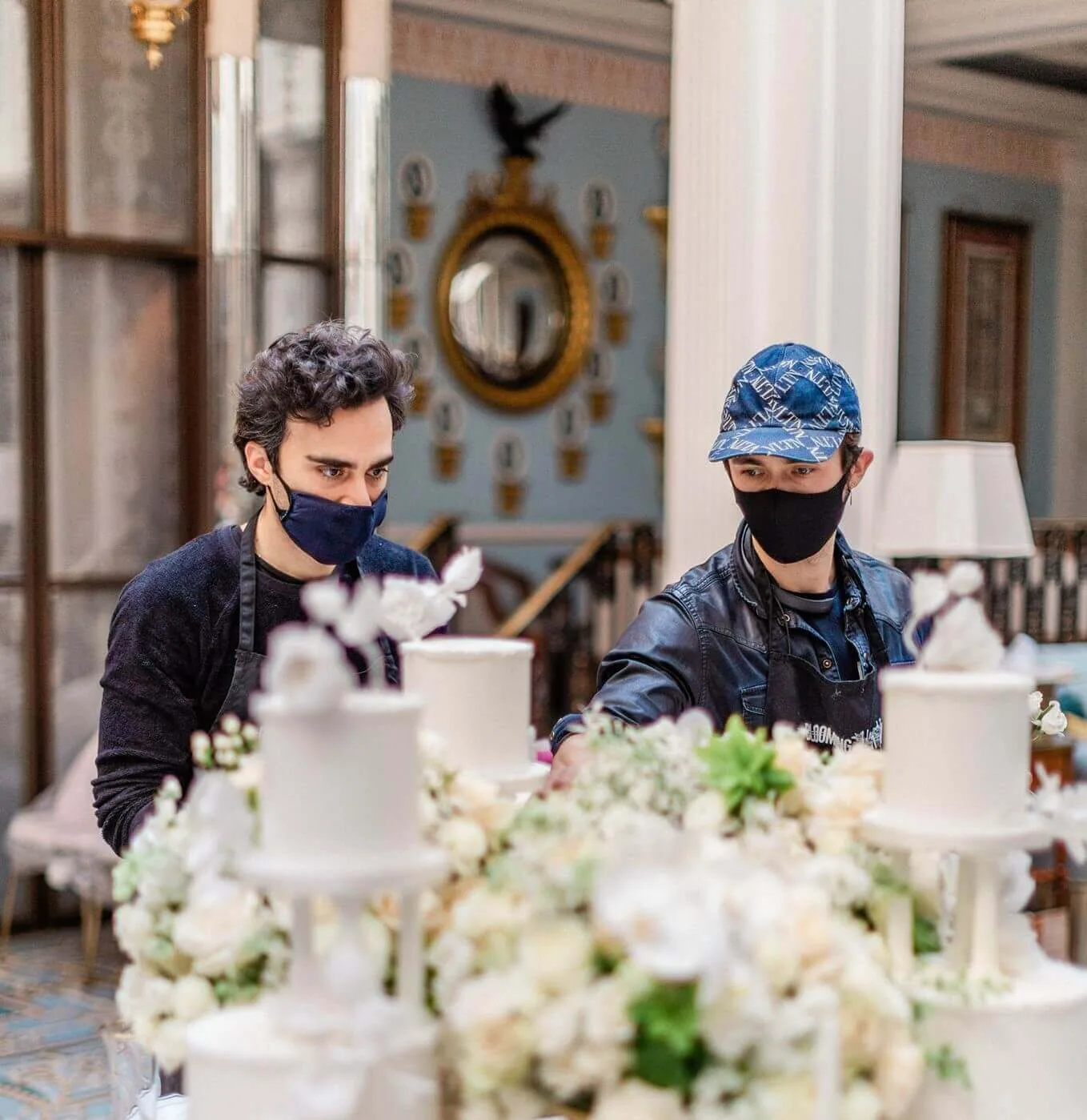 Blooming haus completing floral wedding designs on the day