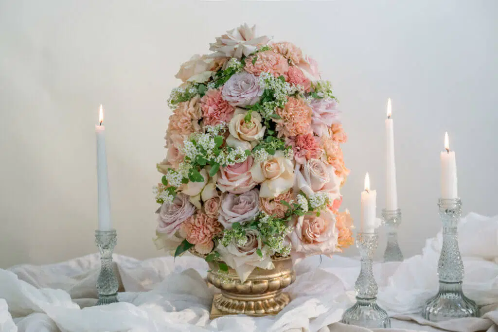 Roses and spirea wedding table arrangement