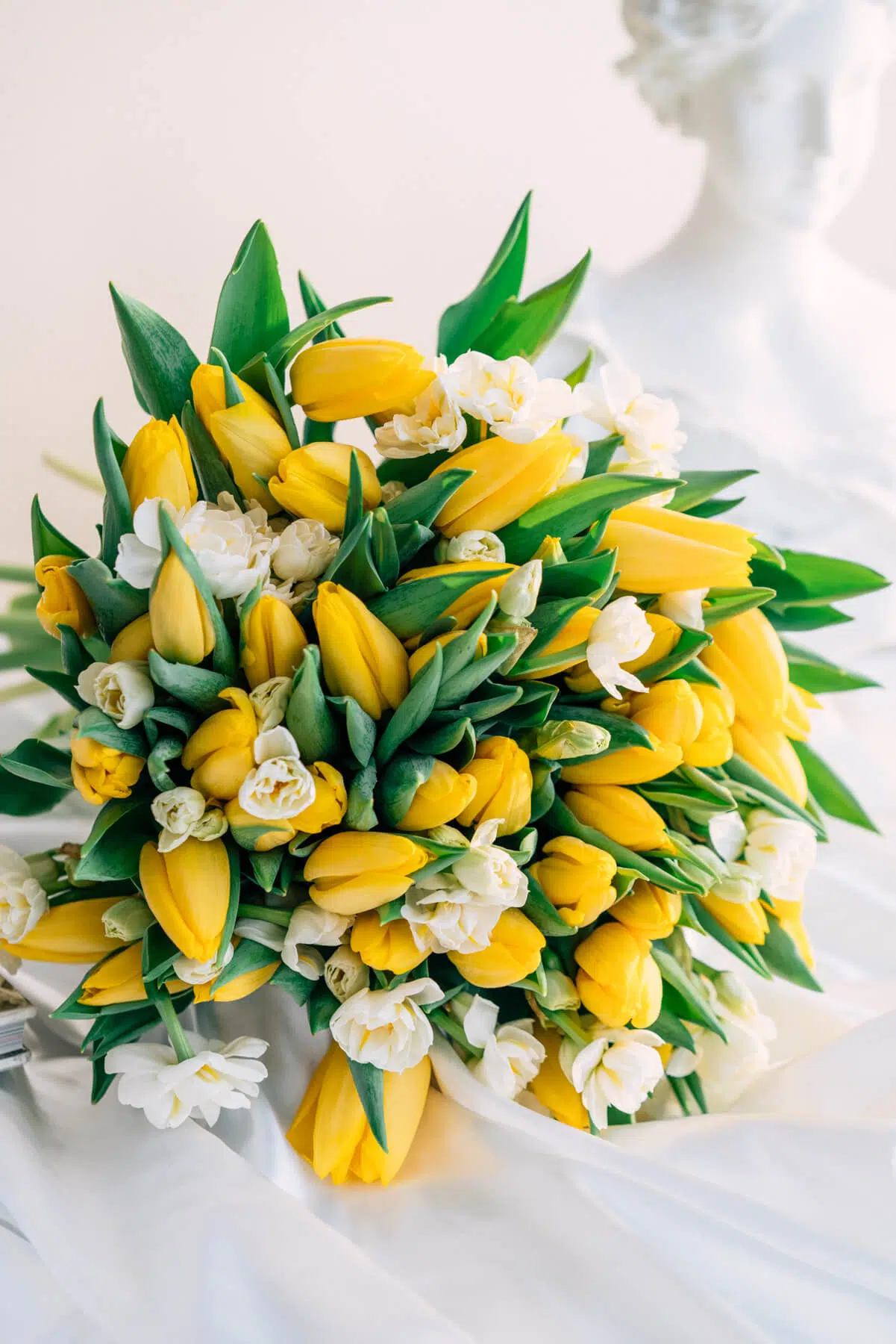 Yellow tulips and daffodils bouquet
